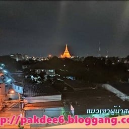 เดินขึ้นบันได 5 ชั้นเล่นเอาหอบ พอเห็นวิวองค์พระแล้วหายเหนื่อย
