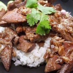 Fried Liver With Garlic And Chili On Rice
