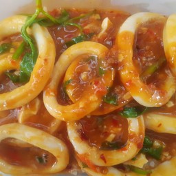 Stir-Fried Squid With Salted Egg Sauce On Rice