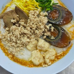 โจ๊กหมูต้มยำ + ไข่เยี่ยวม้า