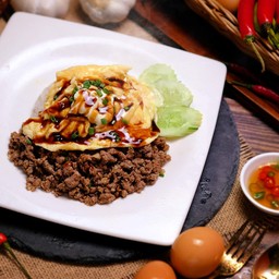 เนื้อโคขุนผัดซอสสไตล์ญี่ปุ่นบนไข่ข้น