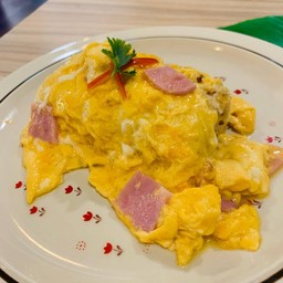 Soft omelette with ham and crab stick served with steamed riceberry rice
