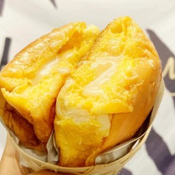 ปังปิ้งใส้ทะลักเนยนม
