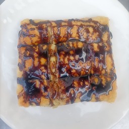 โรตีใส่ไข่+กล้วย+ราดช็อกโกแลต