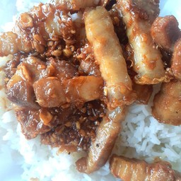 Stir Fried Crispy Pork With Garlic And Pepper On Rice