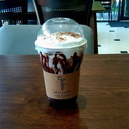ice darkchoc milk to table