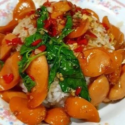 Rice with basil and sausage.