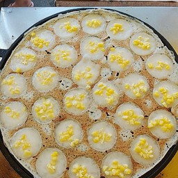 ยกแผ่นข้าวโพด