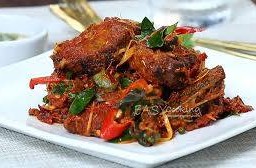 ผัดเผ็ดปลาดุกทอดกรอบ