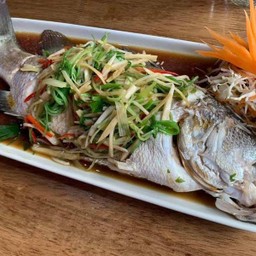 ปลากะพงนึ่งซีอิ้ว Steamed Sea Bass Fish with soy sauce