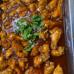 ปีกบนไก่ทอดอบซอสมะเขือเทศ  (ไก่น้ำแดง)