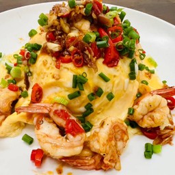 Creamy Omelet With Shrimp With Chili And Salt On Rice