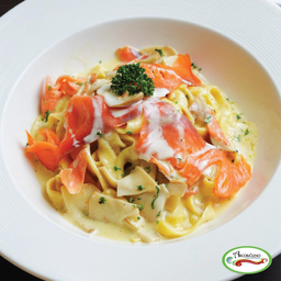 Homemade fettuccine with salmon