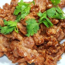 ข้าวหมูทอดกระเทียมพริกไท