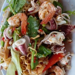 ร้านตาวันขายข้าว หน้าลานจอดรถ7-11ทรงพล  ก่อนจะถึงร้าน ปั้น คำ หอม