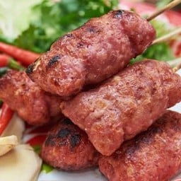 ลูกชิ้นย่างเนยและน้ำอัดลม