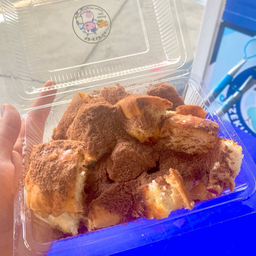 ปังปิ้งหั่นชิ้นนมโรยผงโอวัลติน