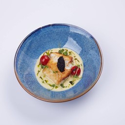 Seared snow fish with Vongole caviar sauce