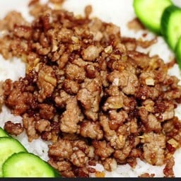 หมูผัดน้ำมันหอยราดข้าว