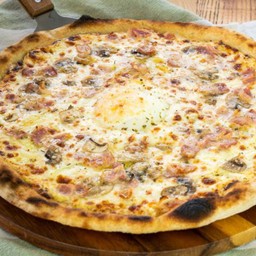 Carbonara Pizza topped with Onsen Egg