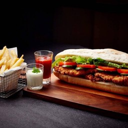 Baguette with schnitzel, humus,chip, salad