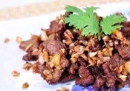 ข้าวเนื้อกระเทียม