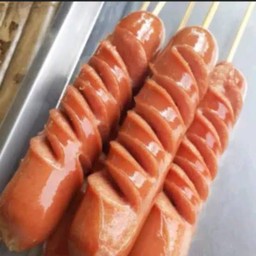 ไส้กรอกไก่จัมโบ้รมควันเบนทาโกทอดร้อนๆน้ำจิ้มรสเด็ด1ชิ้น