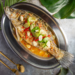 ปลากระพงนึ่งมะนาว Steamed Sea Bass with Lime and chillie