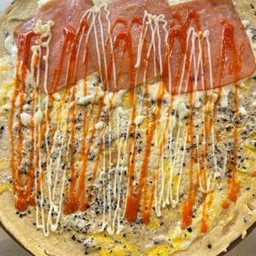 Truffle sauce sausage egg & cheese crepe