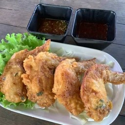 ปีกไก่ทอดสมุนไพร 4 ชิ้น