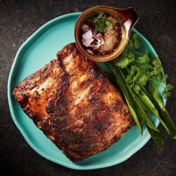 Grilled pork ribs served with spicy tamarind sauce