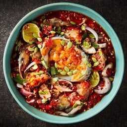 Spicy salad with fish sauce marinated crab and white popinac seeds