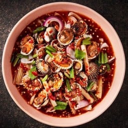 Spicy salad with blanched cockles, lotus stem and white popinac seeds