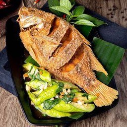 Deep Fried Red Tilapia Fish With Mixed Herbs