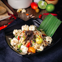 Northeastern style spicy papaya salad and vermicelli