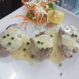 Filetto di maiale al pepe verde