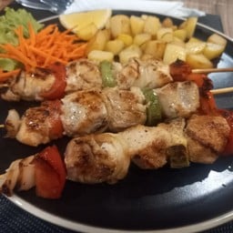 Spiedini di pollo alla piastra