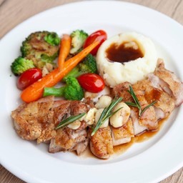 Grilled chicken steak with gravy sauce