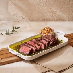 Oikos beef striploin with chimichuri sauce