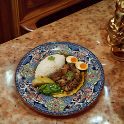 ข้าวคากิล้วนไข่ยางมะตูม
