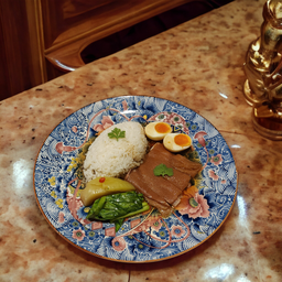 ข้าวขาหมูหนังล้วนไข่ยางมะตูม