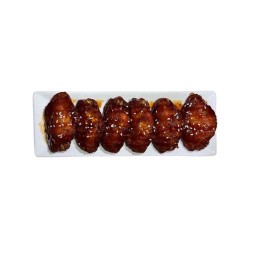 ปีกไก่ทอดราดซอส