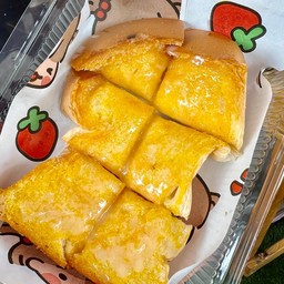 ขนมปังปิ้งเนยนม