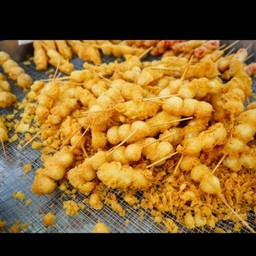 ลูกชิ้นปลาชุบแป้งทอดชุดละ7ไม้59บาท