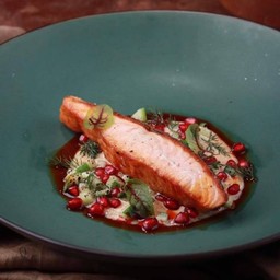 SALMON STEAK WASABI SUACE POMEGRANATE