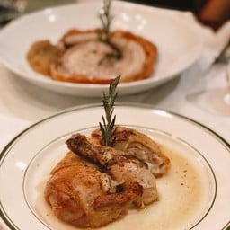 A natural, roasted chicken half