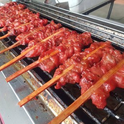 หนังไก่แดงย่าง