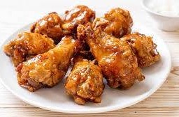 ปีกบนไก่เคลือบซอส