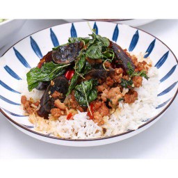 Stir Fried Basil With Century Egg On Rice