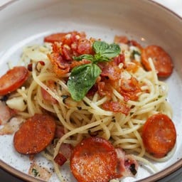 Spiced a.o.p with smoked bacon & sausage  (LM)